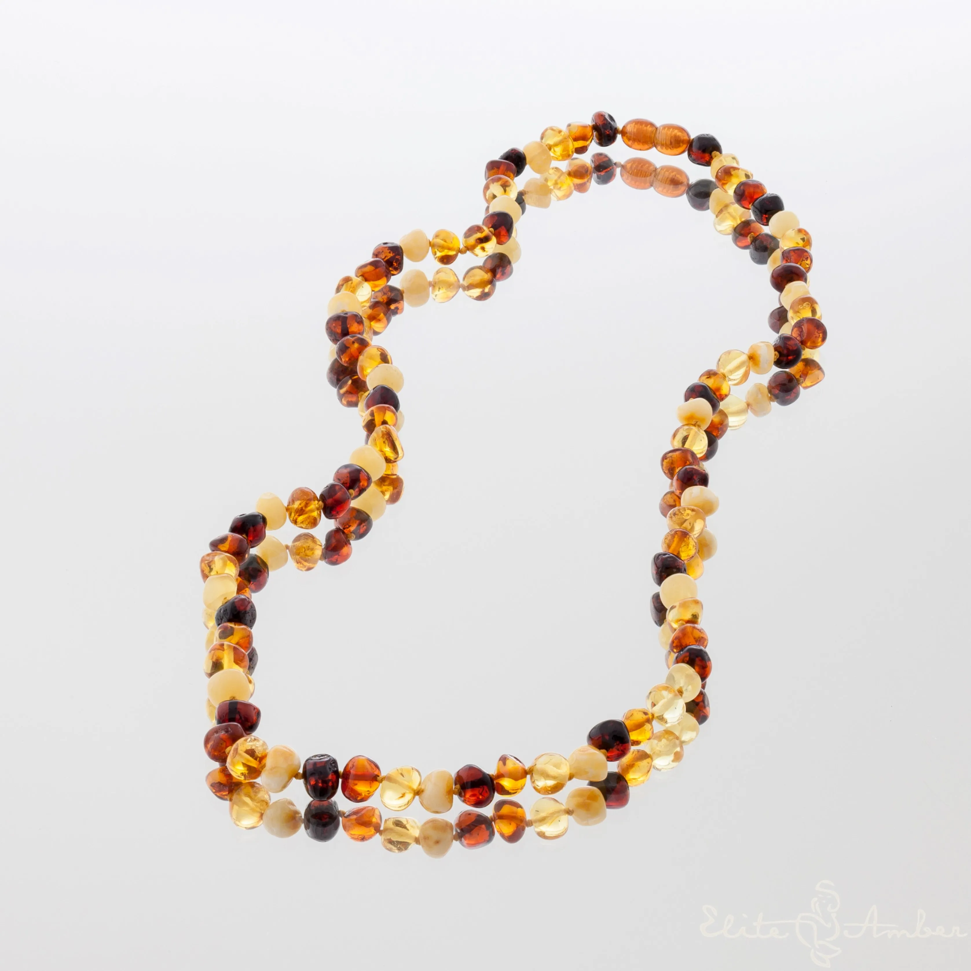 Amber necklace "Four color baroque"