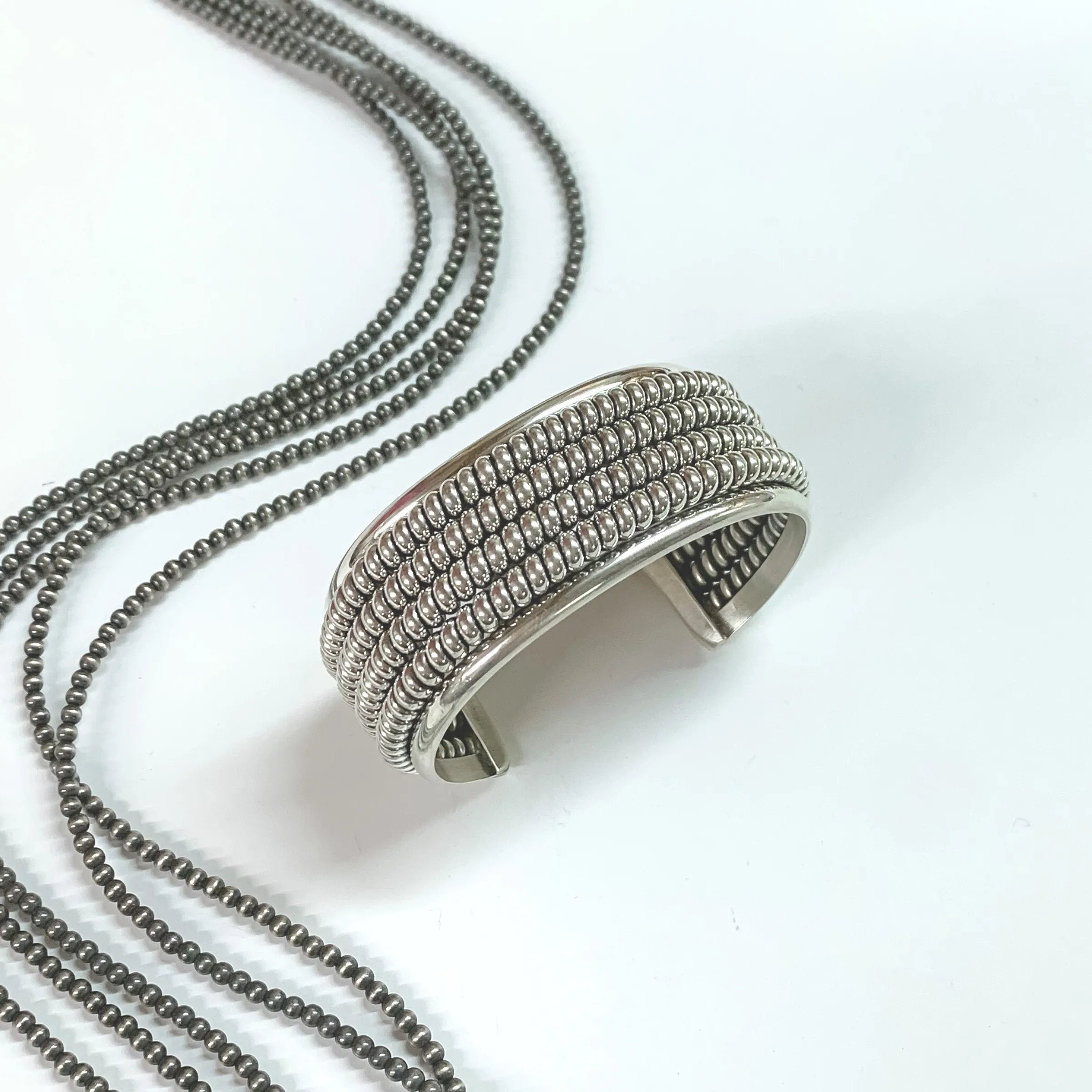 Caroline Tsosie | Navajo Handmade Sterling Silver Cuff Bracelet with Quadruple Rope Detailing Inlay