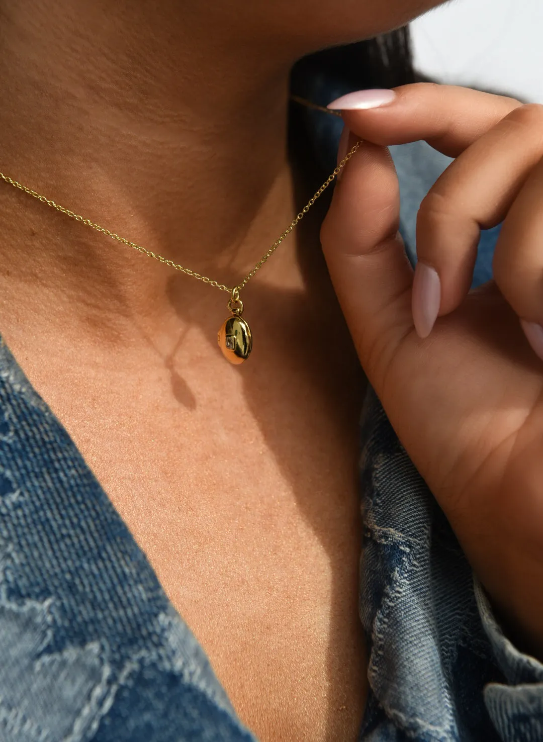 Golden Oval Locket With Cz Centre
