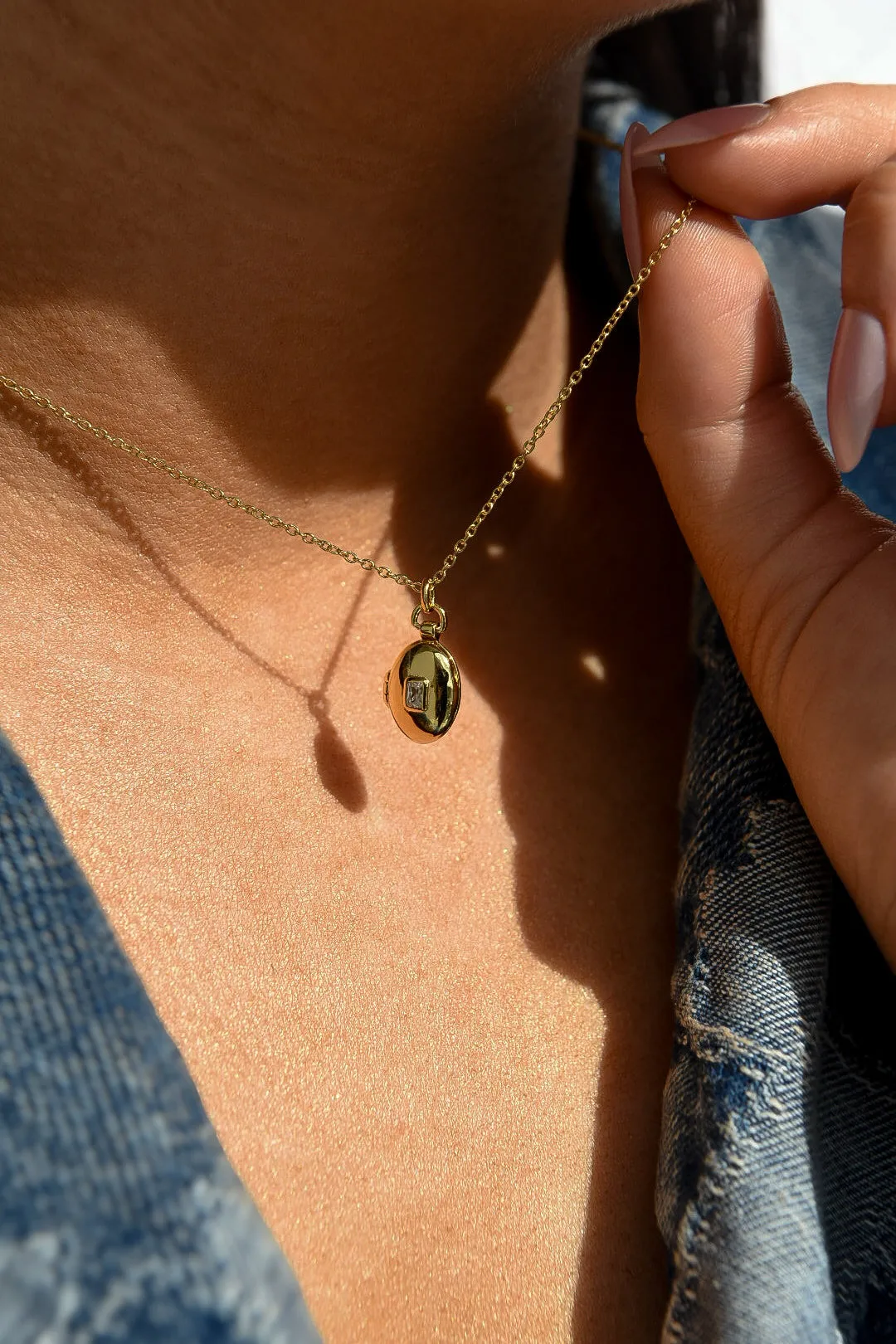 Golden Oval Locket With Cz Centre