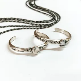 Navajo | Navajo Handmade Detailed Sterling Silver Cuff with Center White Buffalo Stone