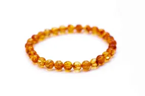 Orange Amber Sphere Bead Bracelet