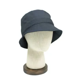 Storage loop bucket hat in tonal navy blue CoolMax seersucker