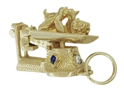 Vintage Baby on a Movable Scale Charm Pendant in 14 Karat Yellow Gold with Ruby, Sapphire, and Diamond